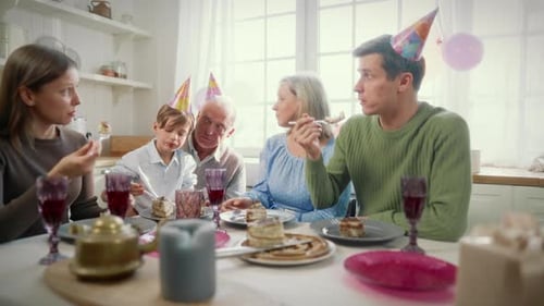Multi-generational Family Celebrating a Birthday at Home