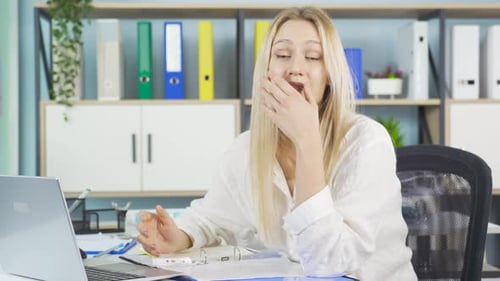 Young Adult Woman Talking in the Office