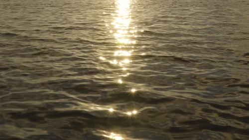 ocean water waves with reflected sunbursts landscape