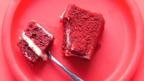Delicious Red Velvet Cake on Red Plate
