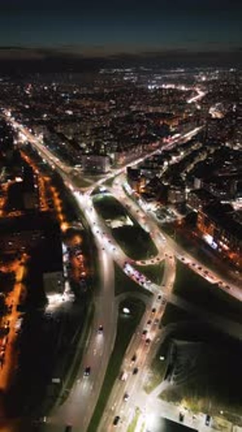 Aerial View of Varna Bulgaria at Sunset Showcasing a Vibrant Cityscape with Illuminated Streets
