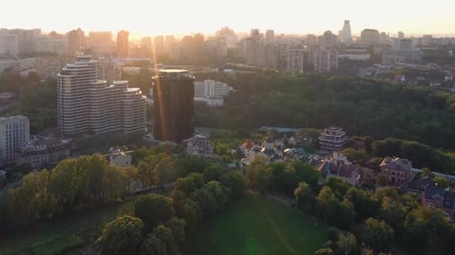 View From Drone on the City with Bright Evening Sunlight