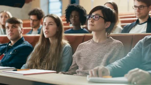 College Students Paying Attention in Lecture Hall