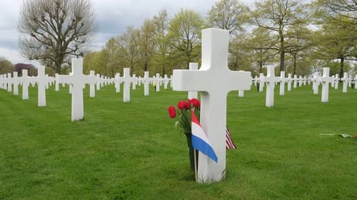 American memorial war cemetery, white cross, US and Dutch flag