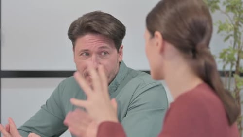 Close Up of Business People Talking in Office