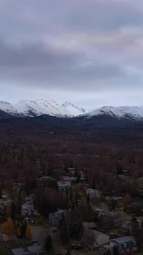 Anchorage City in Cloudy Autumn Morning Alaska USA Aerial View Vertical Video