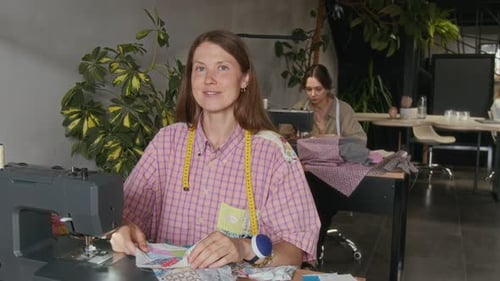 Portrait of Happy Seamstress Working on Patchwork Design in Workshop