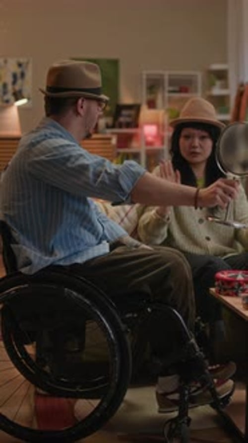 Diverse Friends Trying on Vintage Accessories in Cozy Thrift Shop