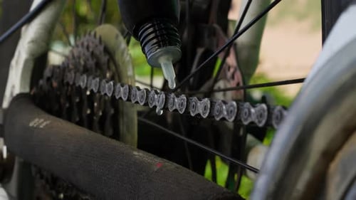 Bicycle chain lubrication, bike maintenance in cycling workshop