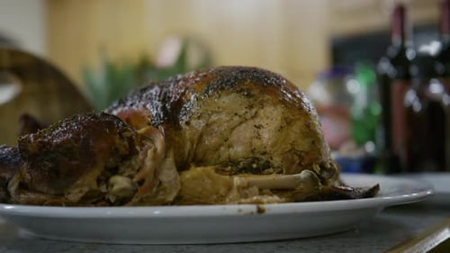 Golden Roasted Whole Chicken Turkey on Plate with Herbs and Crispy Skin Home Cooking Traditional