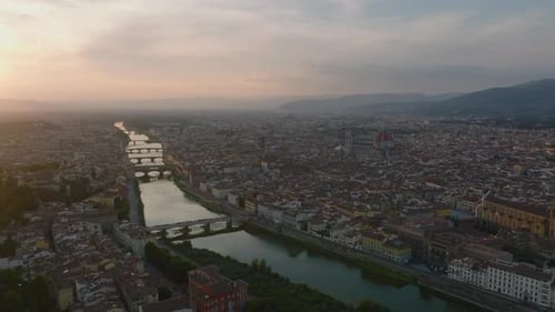 Aerial View of Series of Bridges Spanning Arno River in Old Town