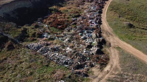 Aerial Panoramic View of Huge City Garbage Dump at Sunset