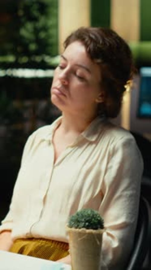 Vertical Video Entrepreneur Contemplating on a Complex Problem in a Dark Office Late at Night