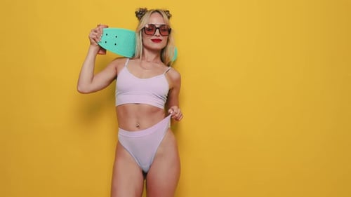 Young beautiful woman in swimwear