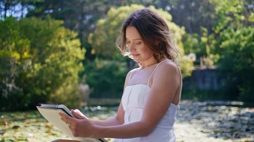 Dreamy Girl Sketching Album Relaxing at Forest Landscape Closeup Woman Drawing