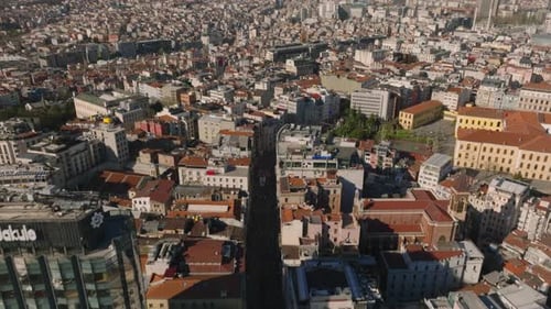 High Angle View of Streets and Buildings in City Tilt Up Reveal of Cityscape with High Rise Office