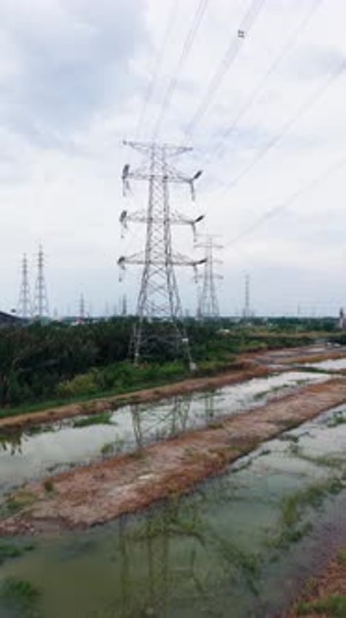 Aerial View Pan of the New Bridge and the Electricity Towers in Ho Chi Minh City.