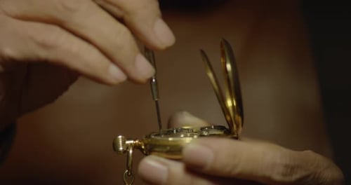 Gold Pocket Watch Mechanism Repair Close Up