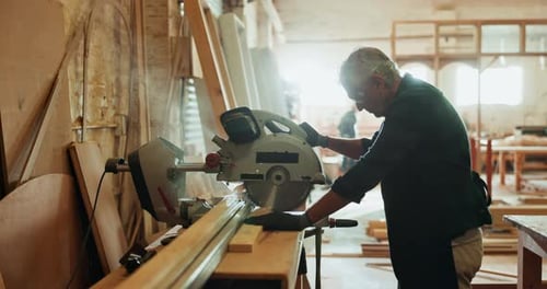 Mature man, circular saw and timber for construction, building or project for material