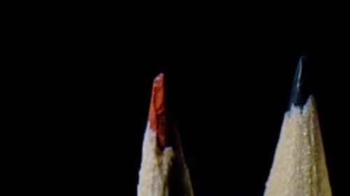 Vivid Sharpened Colored Pencils Against Dark Background