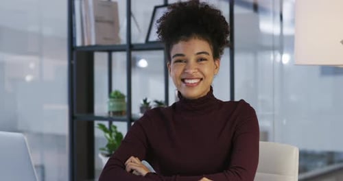 4k video footage of young businesswoman using a laptop in a modern office