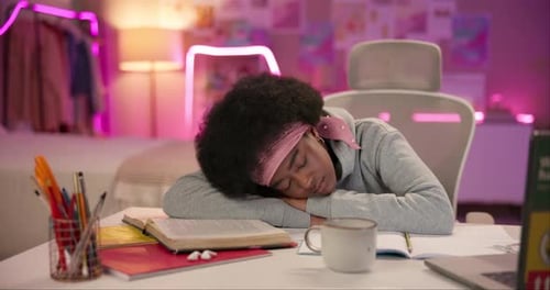 Girl, student and sleeping by books in bedroom, laptop and study with fatigue
