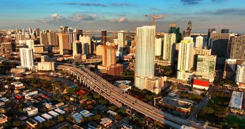 Bright light of setting sun illuminating the skyscrapers in the uptown of Miami, Florida, USA.