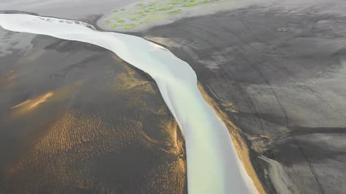 Aerial view of a river along the coast, Iceland.