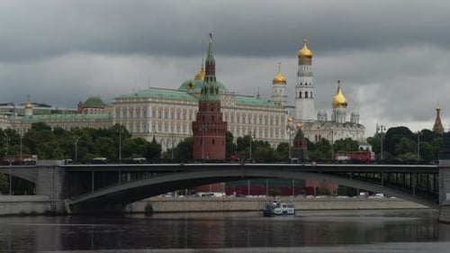 Russia, Moscow, view on Kremlin and river in the evening on against dramatic cloudy sky.