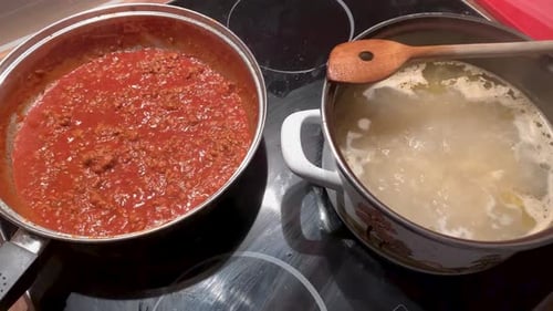 Pasta and Sauce Cooking on Stovetop