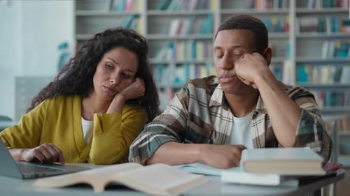 Bored Ethnic Students Studying Burnout in Library Laptop Project Homework Tired African American Man