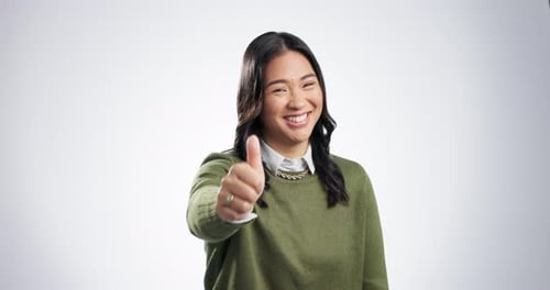 Happy Woman Giving Thumbs Up Approval