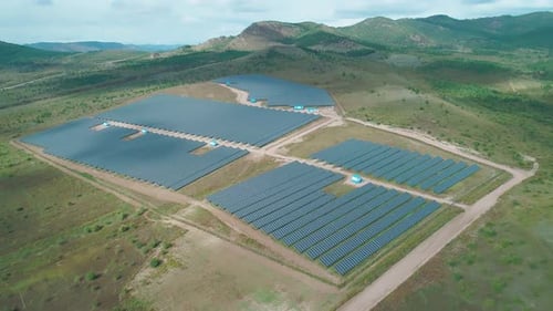 Aerial High Angle View of Solar Panels Farm Solar Cells Renewable Green Alternative Energy Concept