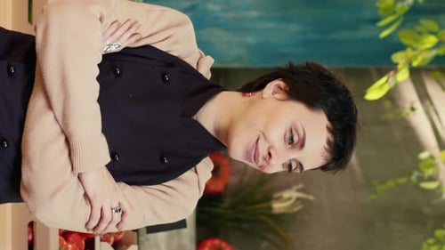 Vertical Video Caucasian Vendor Standing with Amrs Crossed at Farmers Market Stand