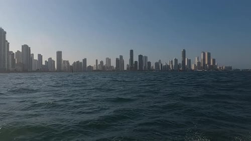 Bocagrande Cartagena Colombia. Sailing by Beachfront Hotels and Apartment Buildings on Sunny Evening