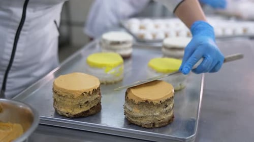 Making sweet cakes. Cream cooking pastry desserts.