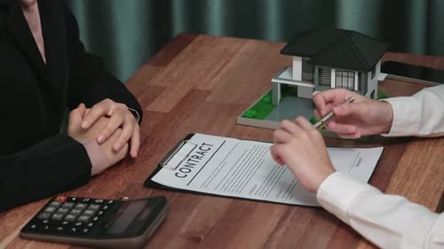 Signing Real Estate Contract in Office Setting
