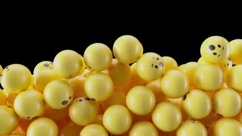 Joyful yellow emoji balls cascade and float in dynamic animation
