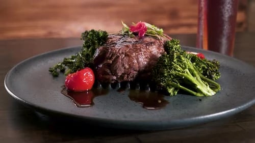 Delicious Steak Meal with Greens on Plate