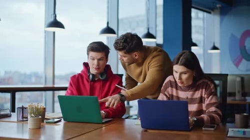 Team Leader Checking Work Two Managers at Office Space Closeup Group Colleagues