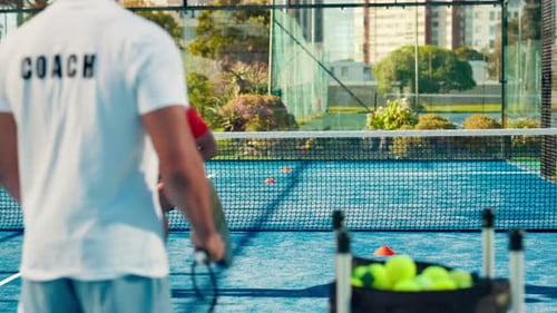 Padel, training and coach with man, court and practice for challenge, wellness and lesson for sport