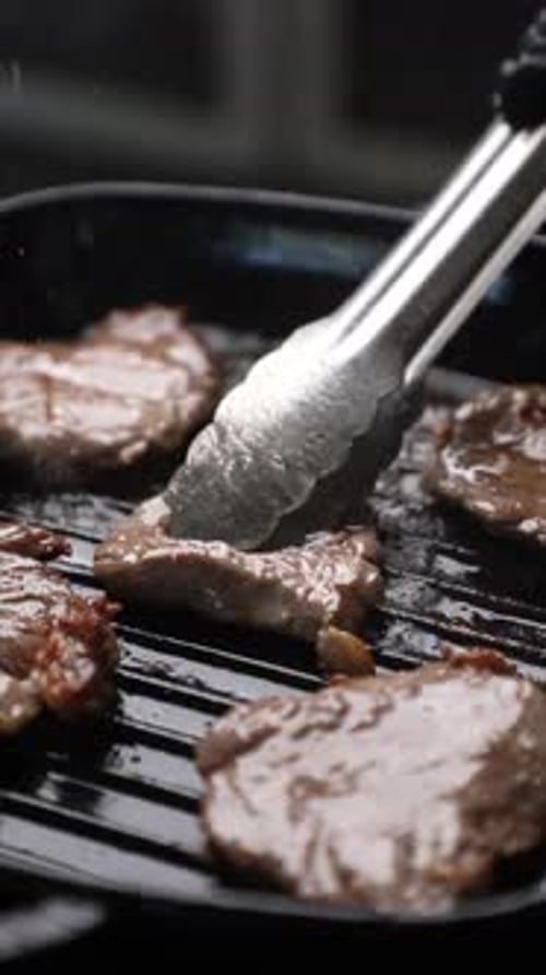 Steak Pieces Being Cooked in Pan