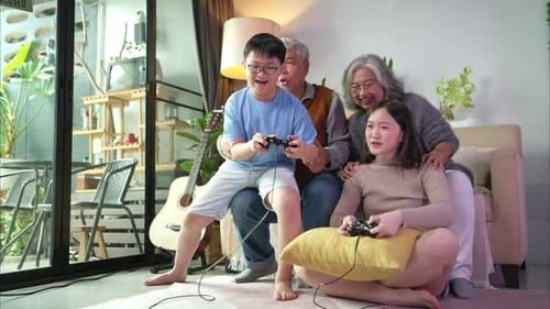 Family playing video games in living room
