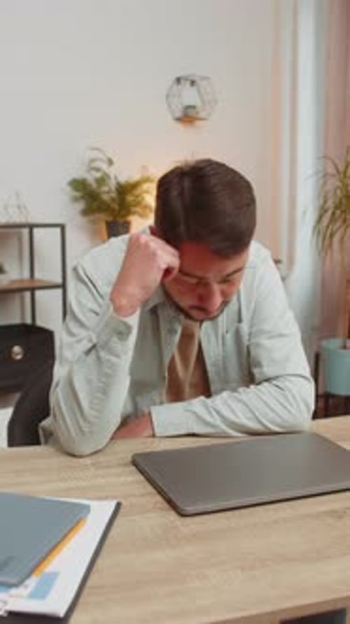 Angry Furious Man Freelancer Using Laptop Working at Home Office Having Nervous Breakdown at Work