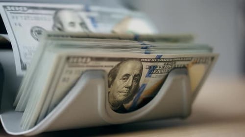 Bank Equipment Counting Dollar Banknotes Close Up