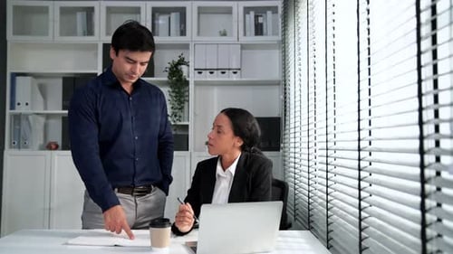 Colleagues Meeting in Modern Corporate Office