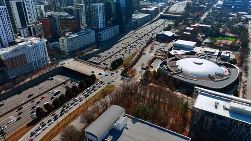 Drone flying above the busy highway in Atlanta downtown. View on the traffic in metropolis