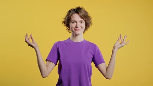 Woman Meditating With Eyes Closed in Studio