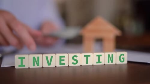 Concept of investing in real estate. Buy a house and living from rental income. Selective focus with