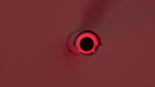 Modern CCTV Security Camera Rotating and Focusing with Red Light